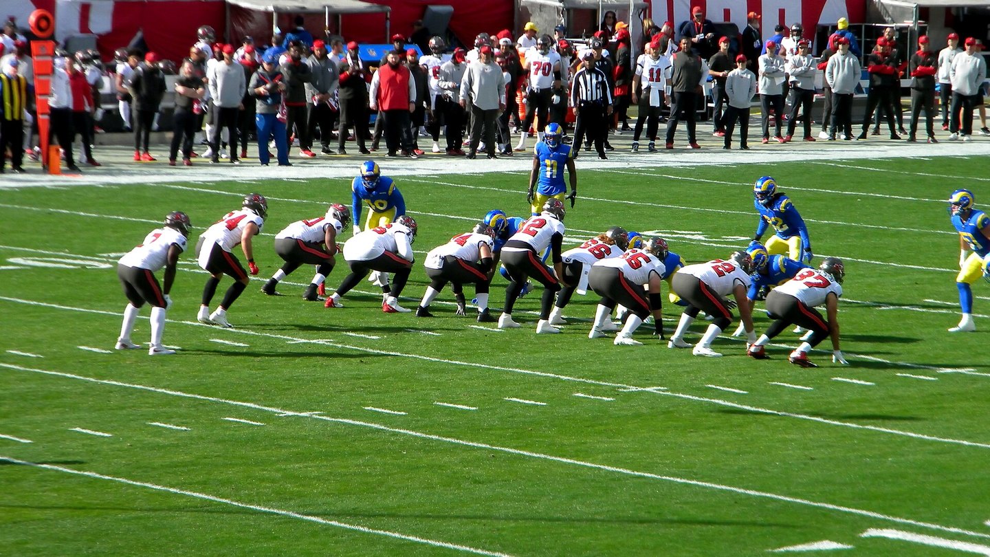 NFL teams lining up at the line of scrimmage